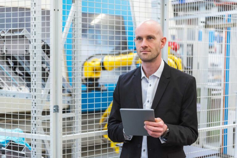businessman-with-tablet-modern-factory (1)